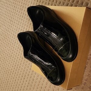 Patent leather, waterproof loafers, size 8, new, worn once.